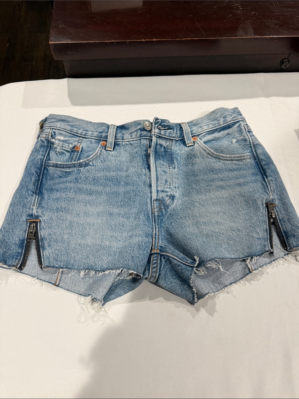 Levi's Faded Light Blue Denim Cutoff Shorts with Side Zips